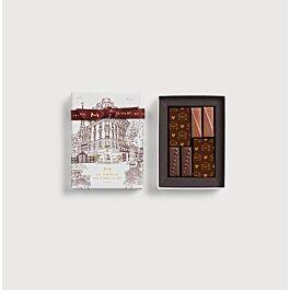 Faubourg Valentine’s Day Gift Box 6 Chocolates on a grey background