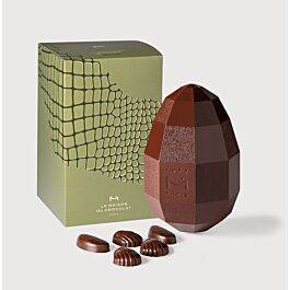 Large Dark Chocolate Easter Egg on grey background