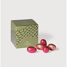 Dark Chocolate Praliné Easter Eggs Case on grey background